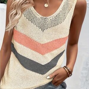 A nicely knit top with a chevron style.